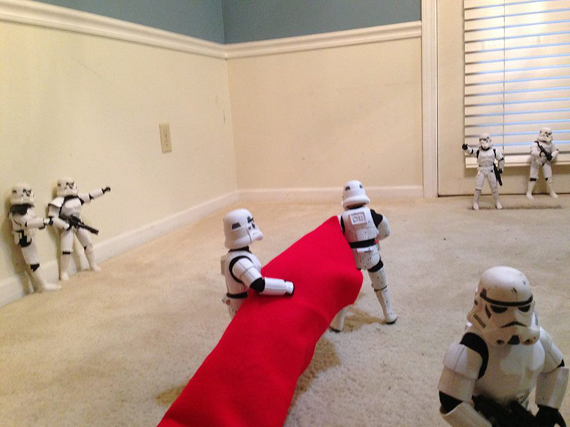 storm troopers put up Christmas tree