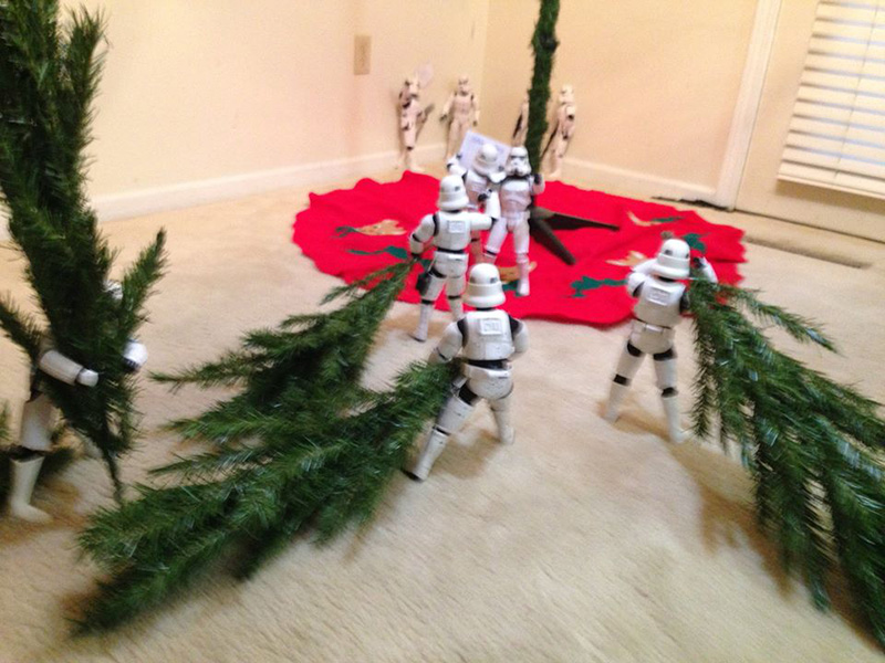 storm troopers put up Christmas tree