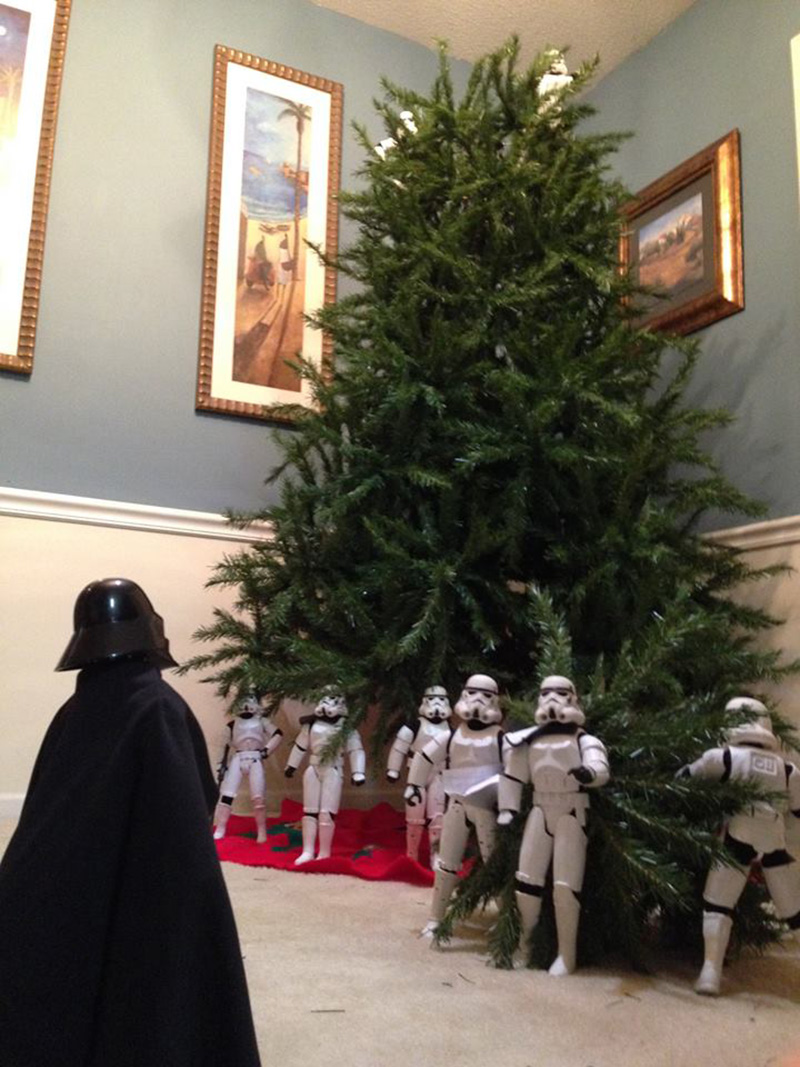 storm troopers put up Christmas tree