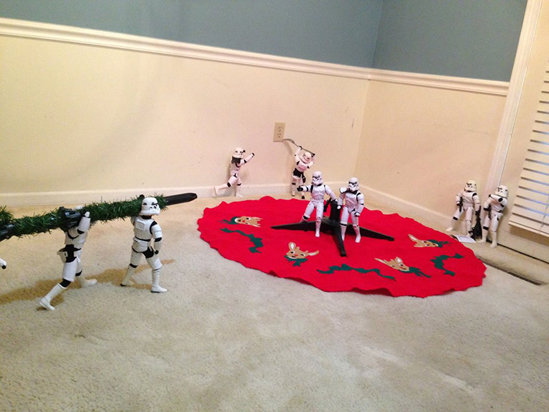 storm troopers put up Christmas tree