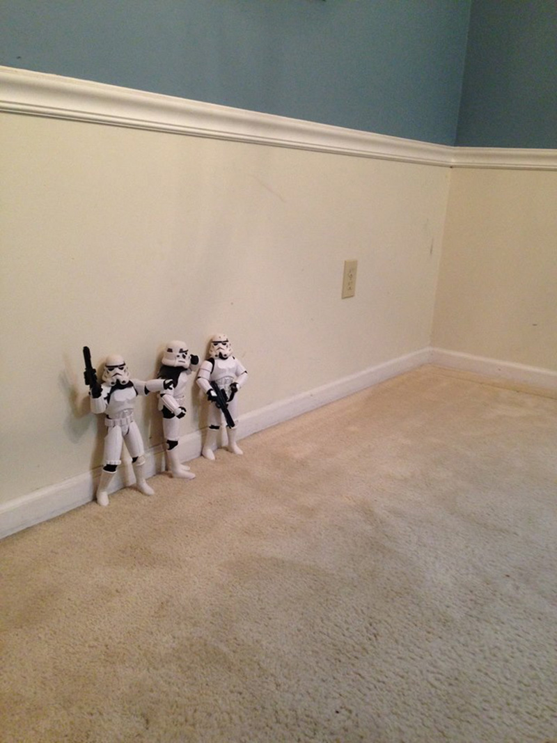 storm troopers put up Christmas tree