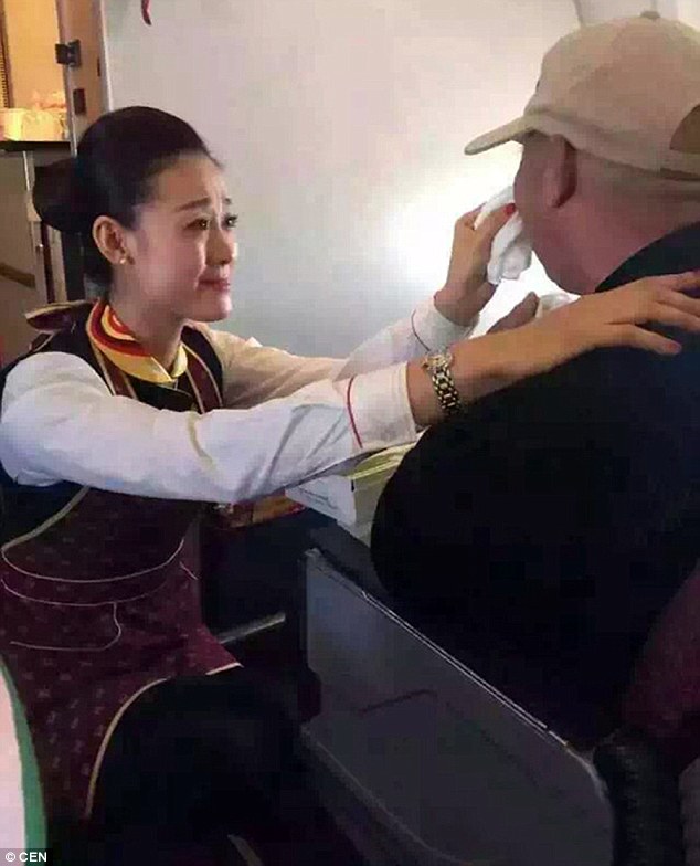 flight attendant feeds disable man