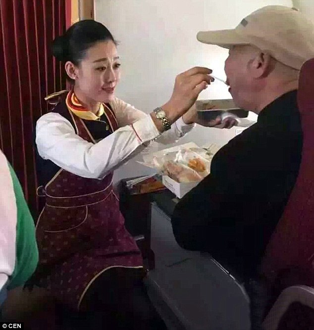 flight attendant feeds disable man