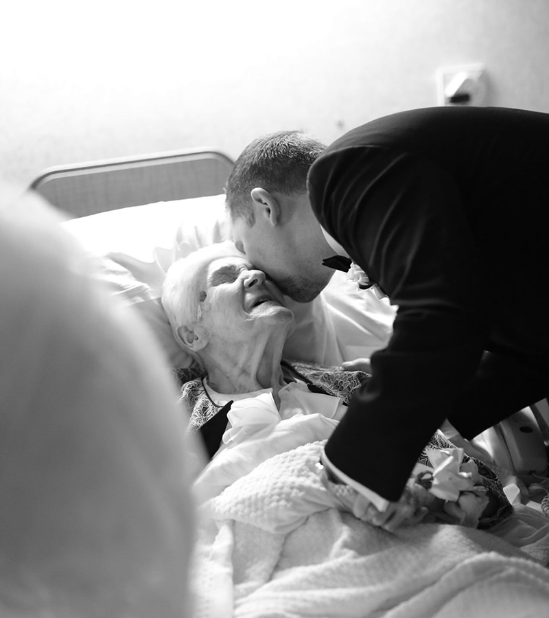 bride and groom visit grandmother in hospital