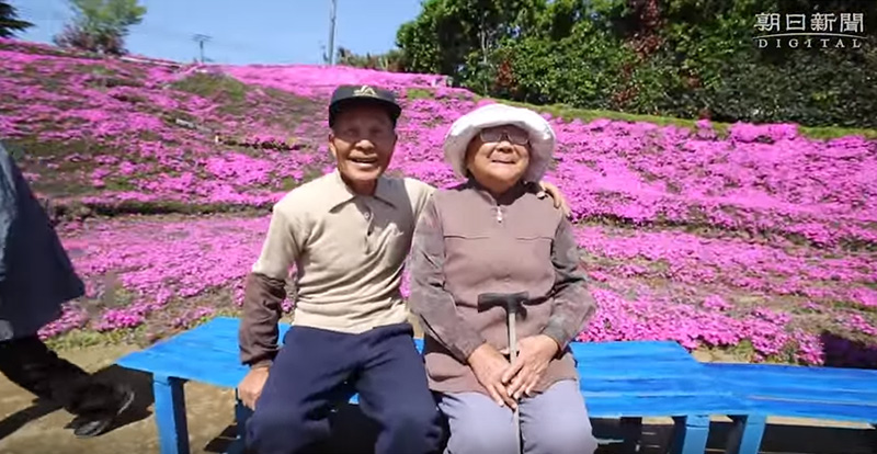 husband plants flowers for blind wife