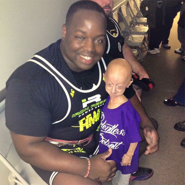 huge bodybuilder bond with girl with cancer