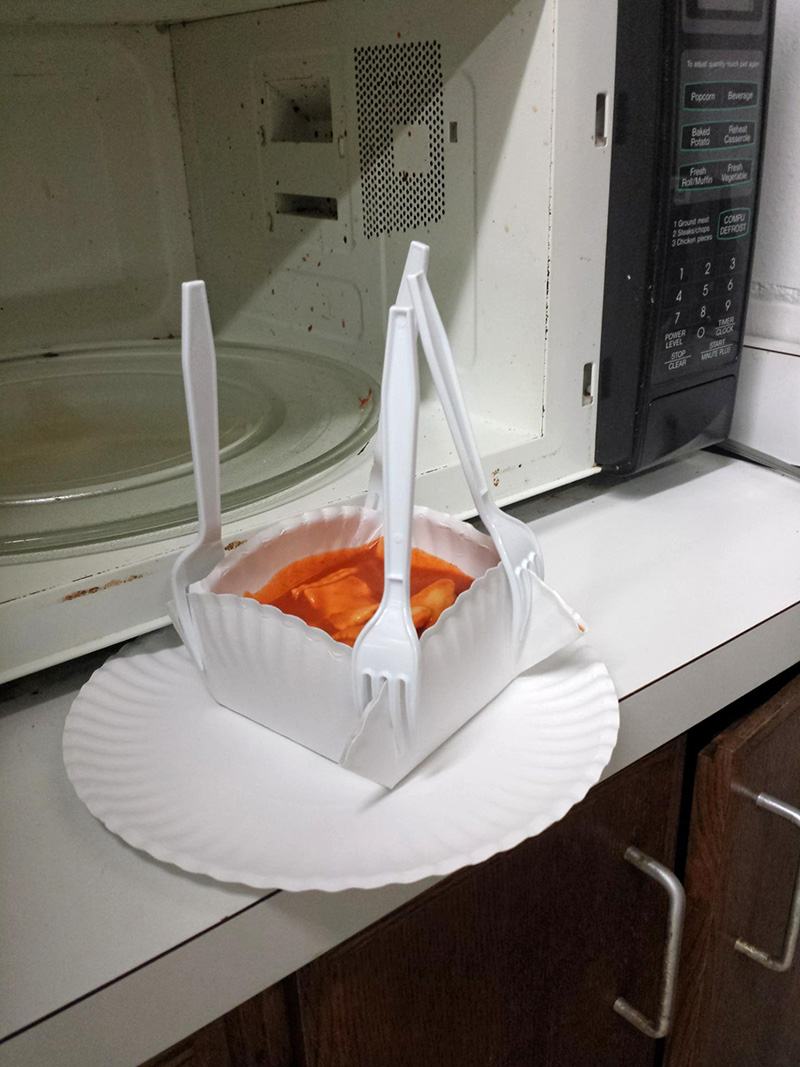 bowl out of paper plates and plastic forks