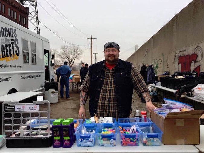 guy helping the homeless shower