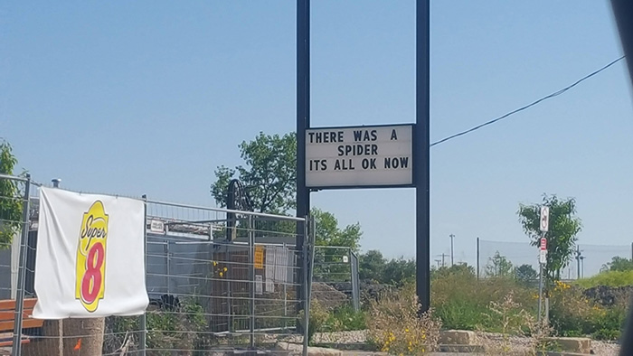 motel 8 rebuilding funny spider sign