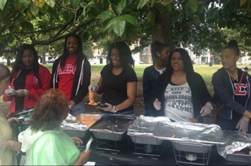 woman uses coupon to feed homeless