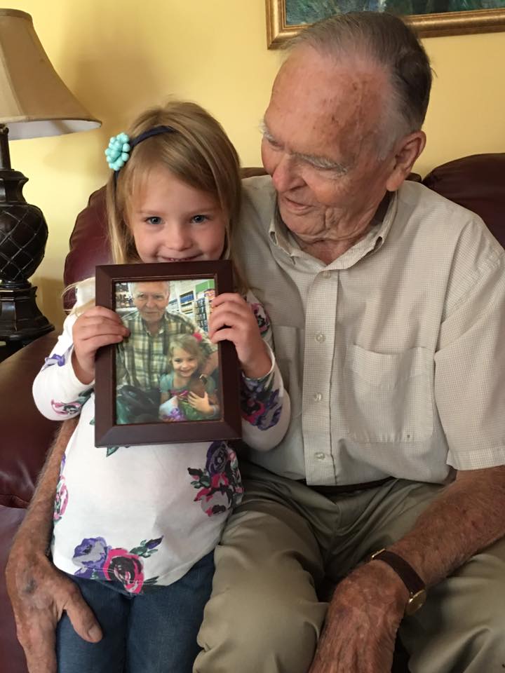 little girl helps old man good news.