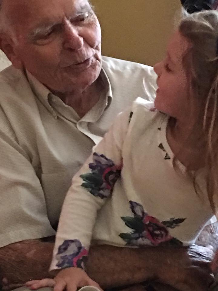 little girl helps old man good news