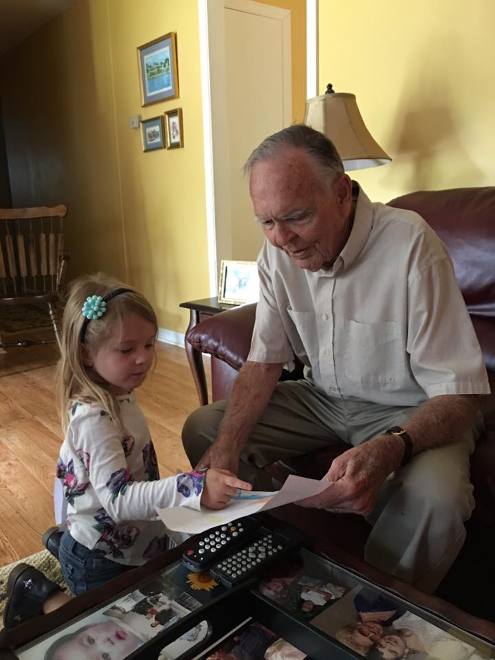 little girl helps old man good news