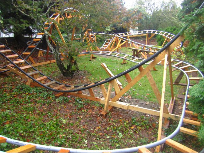 grandpa builds backyard roller coaster grandkids