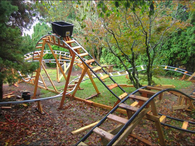 Retired Grandpa Uses Free Time To Build Backyard Roller Coasters For His 6 Grandkids