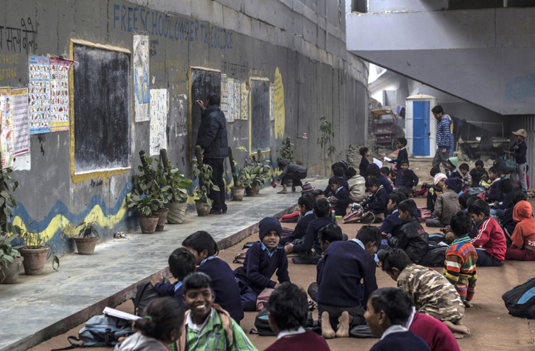 free school under the bridge slum kids India