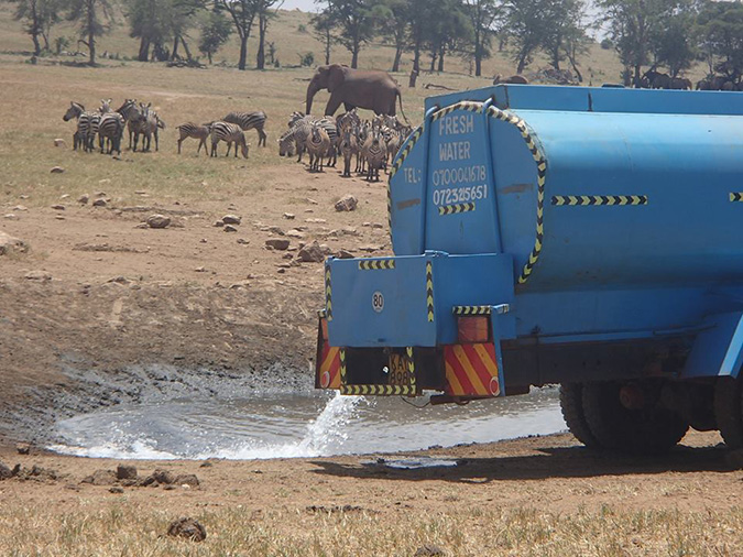 farmer brings wild animals water drought