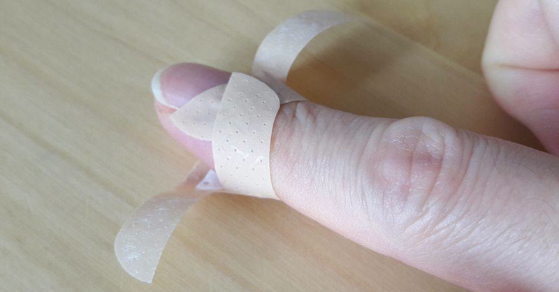 brilliant way to put band aid on finger tip