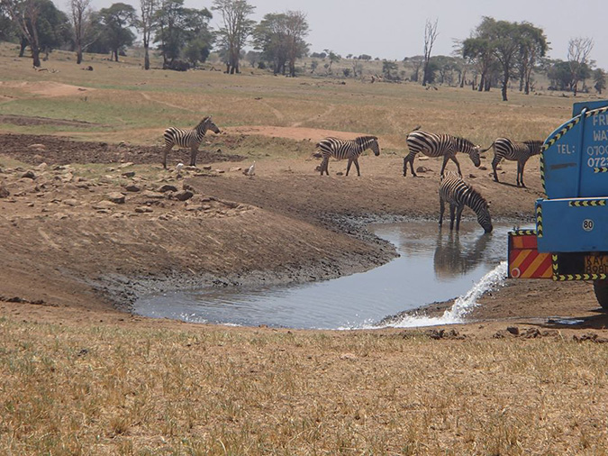 farmer brings wild animals water drought