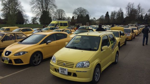 yellow cars rally for man