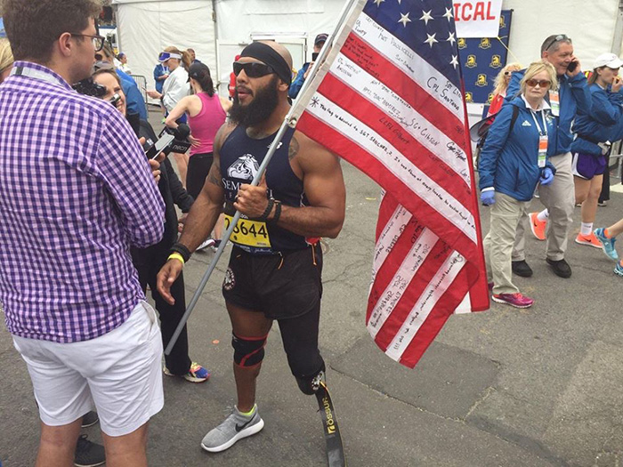 Boston marathon runner American flag one leg