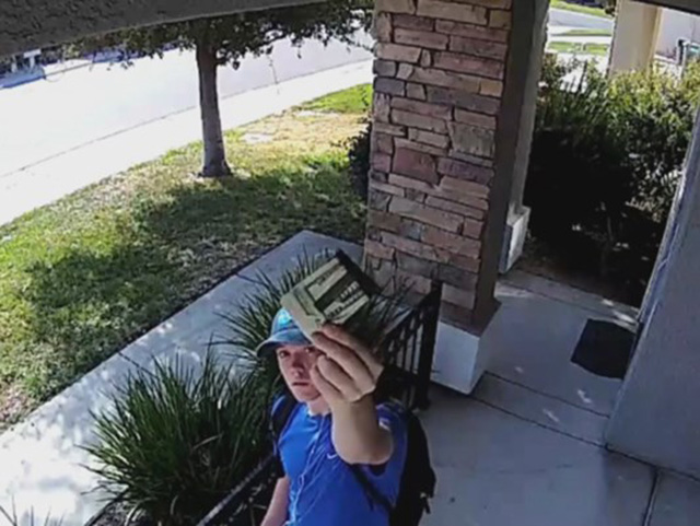 security camera catches man return wallet full of cash