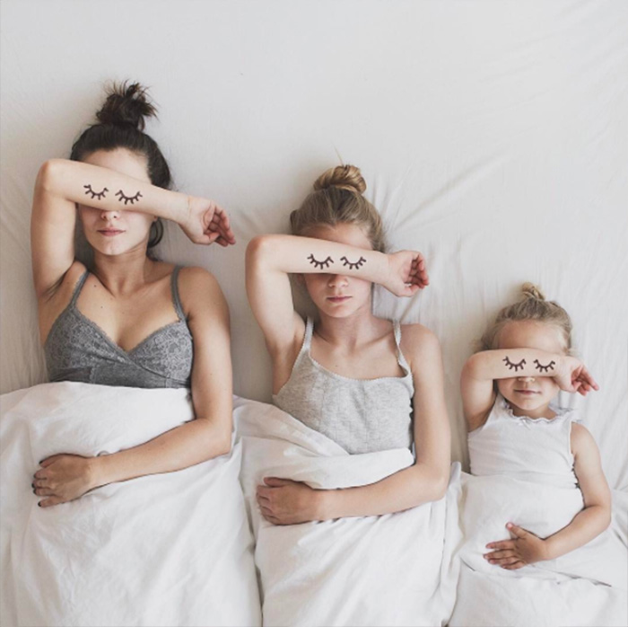 mom and two daughters matching outfits