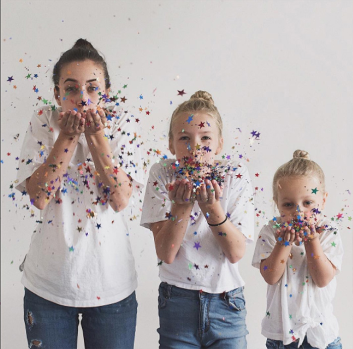 mom and two daughters matching outfits