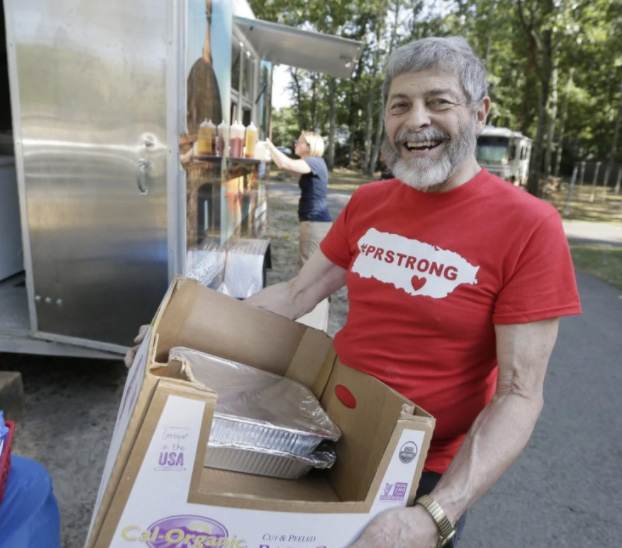 man donates food to Puerto Rico