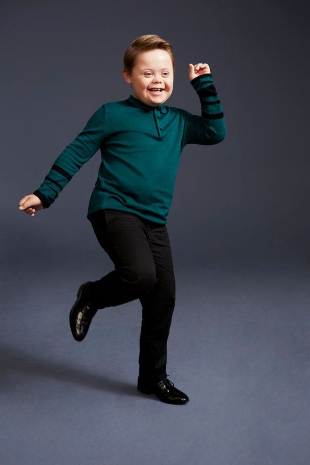 boy down syndrome model clothing store