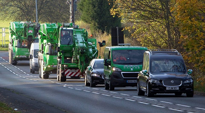 crane funeral procession for man who died