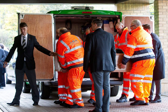 crane funeral procession for man who died