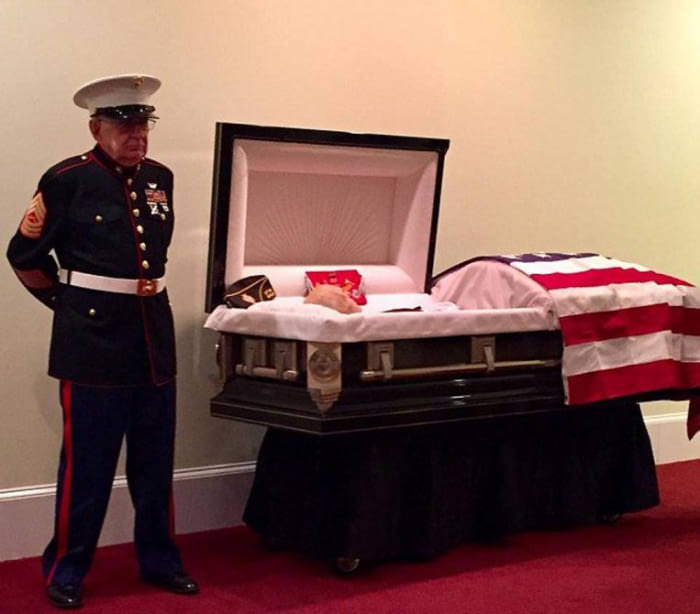 Marine stands guard funeral Vietnam vets