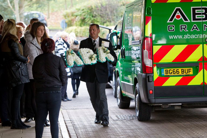 crane funeral procession for man who died