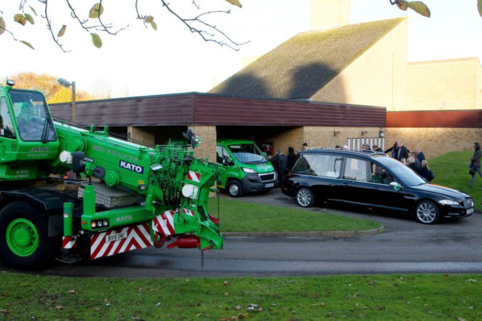 crane funeral procession for man who died