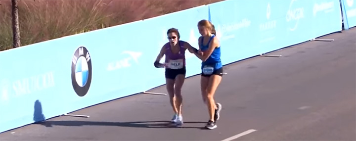 teen helps woman win marathon