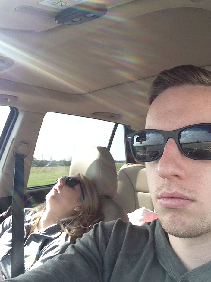 guy posts road trip pictures with wife sleeping in every one