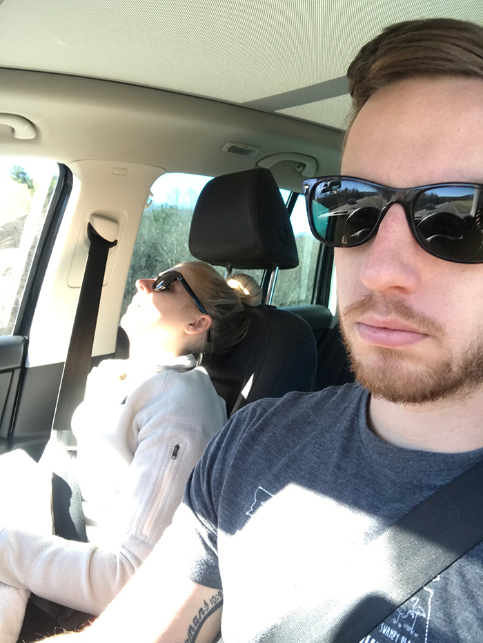 guy posts road trip pictures with wife sleeping in every one