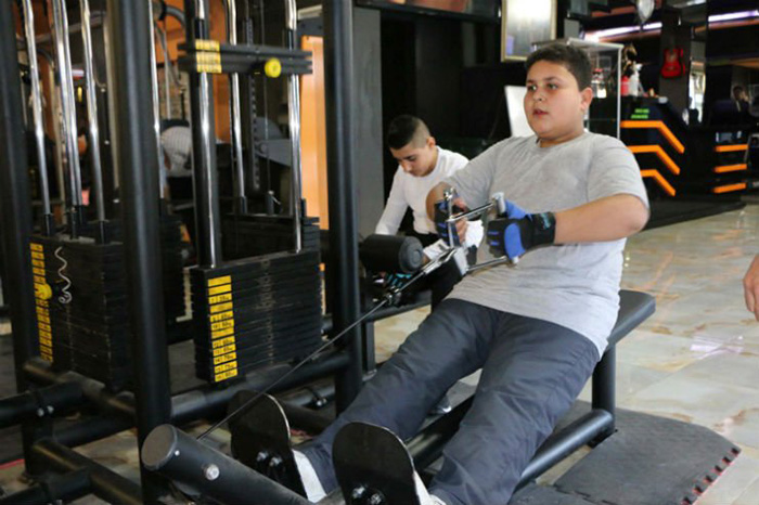 refugee boy gets free membership Turkey gym