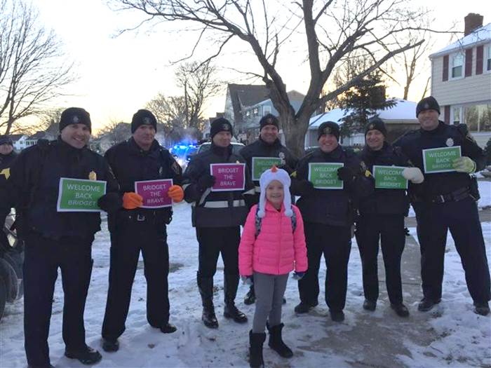 students staff welcome back kid cancer