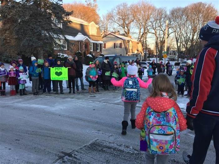 students staff welcome back kid cancer