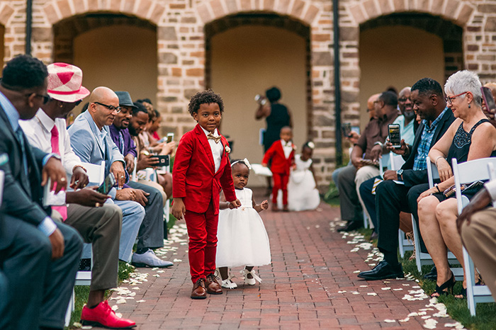 boy in tears at parents wedding