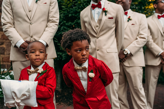 boy in tears at parents wedding