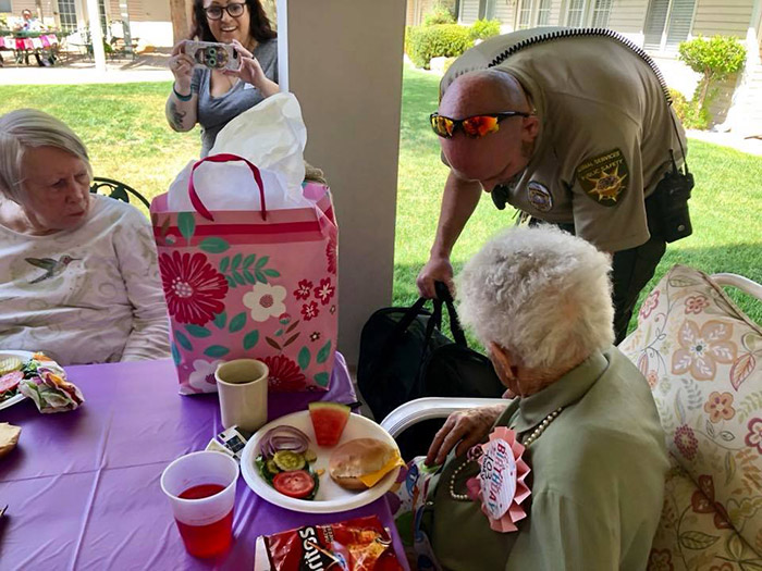 woman surprised with cat 103 birthday