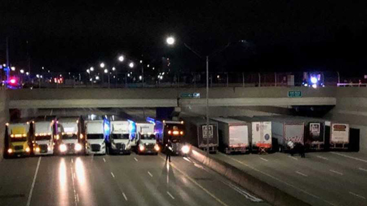 semi trucks line up to stop suicide