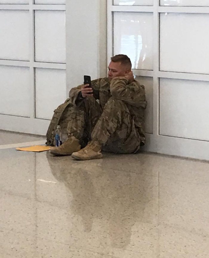 solider watches birth of baby over facetime video at airport