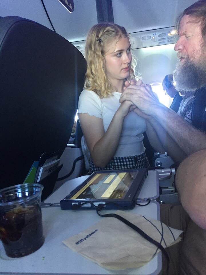 good news stories girl signs for deaf blind man on flight