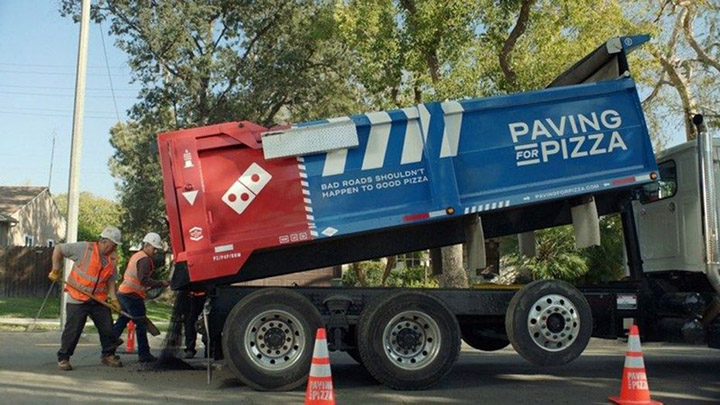 paving for pizza dominos pot holes