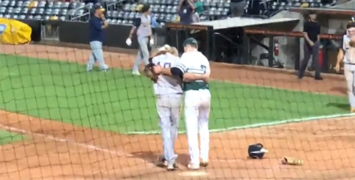 pitcher consoles childhood friend after strike out and win