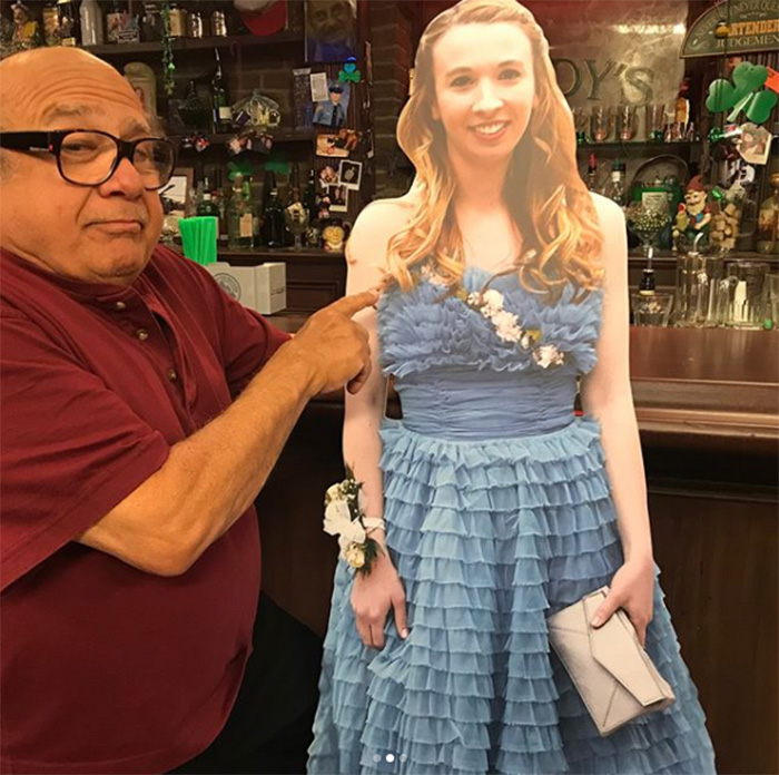 danny devito takes cutout of girl to bar prom